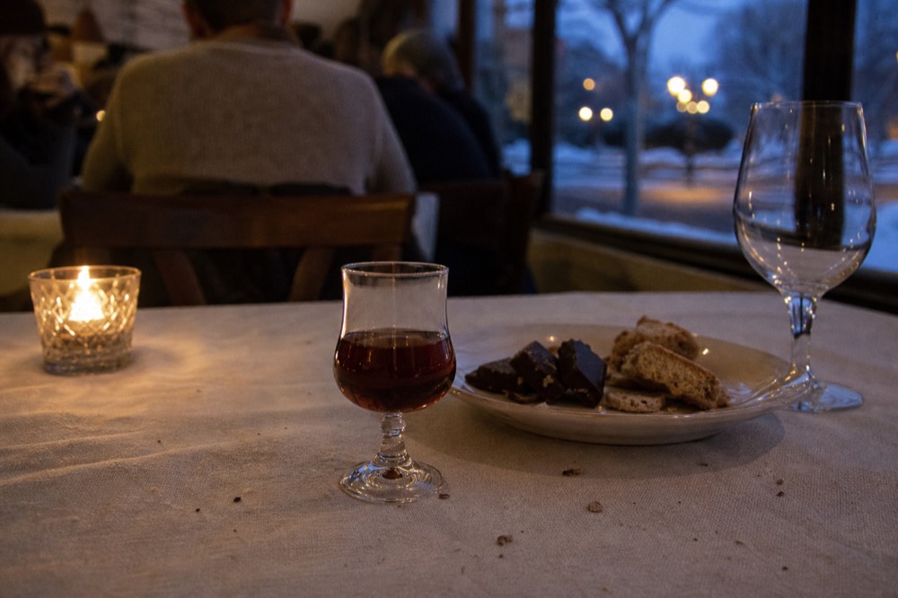 Recioto wine glass and dessert, no text, no logos, no people